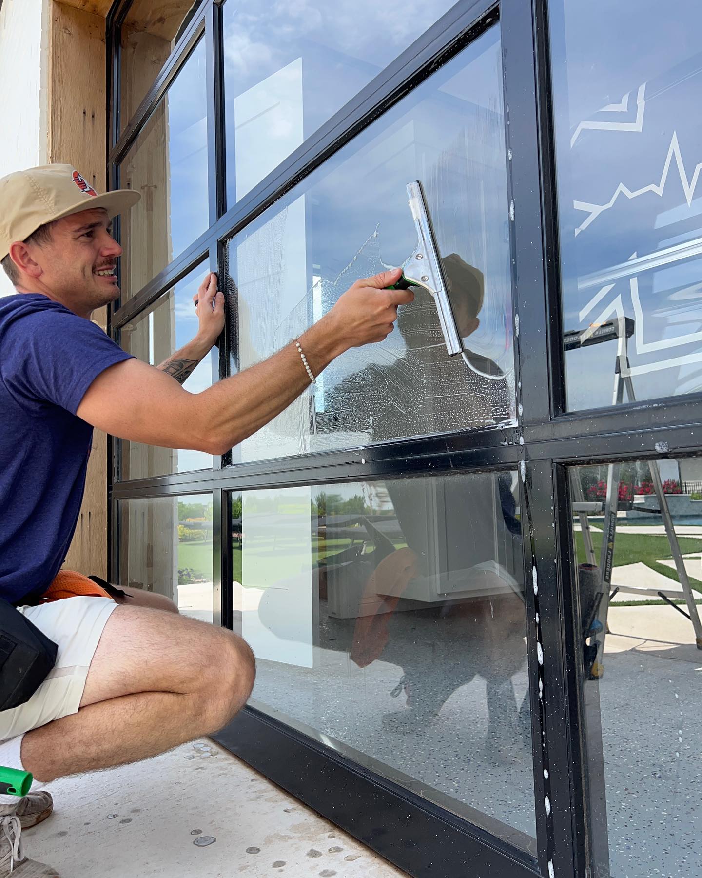 Streakers Window Cleaning technician cleaning windows in Oklahoma City